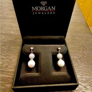 White gold pearl and diamond earring set.